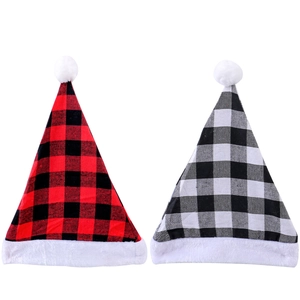 Pair of festive red and black buffalo plaid Christmas hats with white plush trim and pompom