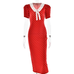Elegant red polka dot midi dress with white Peter Pan collar and bow on a white background