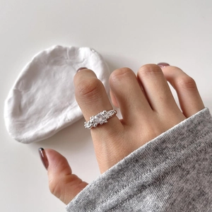 S925 silver ring featuring irregular bubble cubic zirconia worn on a finger