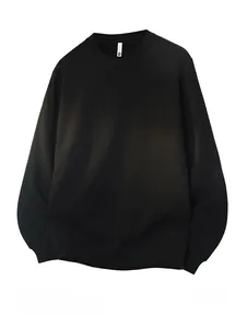 Detail of classic black crewneck sweatshirt featuring ribbed collar and heavy cotton texture