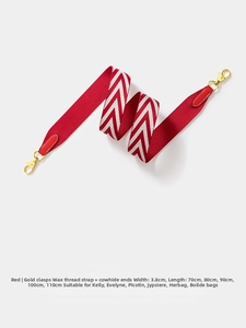 Detail of 3.8cm wide red and white chevron strap with golden hooks for crossbody bags