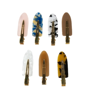 Set of 7 seamless marble and amber patterned acetate hair clips with gold metal base