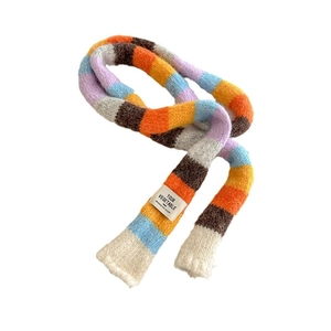 Rainbow striped knitted scarf with soft colorful layers on a clean white background