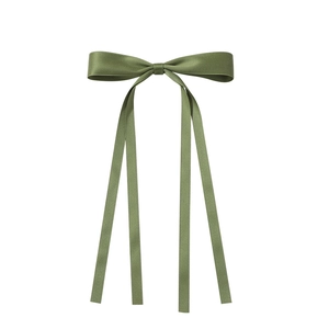 Detail of elegant olive green satin ribbon bow with smooth texture and subtle luster