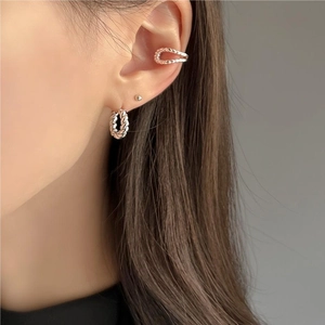 925 sterling silver twisted hoop earrings and ear cuff set shown on a female model