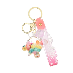 Creative liquid sand turtle keychain with pink wrist strap and colorful floating beads