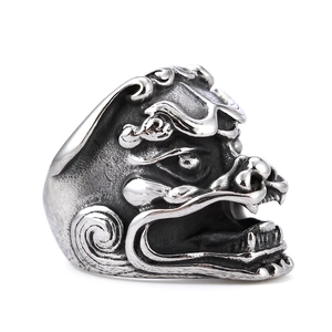 Vintage punk style Kirin ring with oxidized silver finish and intricate carved details