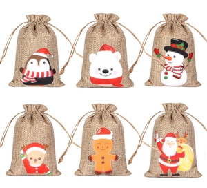 Set of 6 Christmas linen drawstring gift bags featuring festive cartoon characters