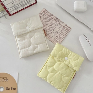 Portable heart quilted sanitary napkin storage pouch set in cream and soft yellow