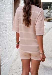 Rear view of pink hollow out mesh knit top and shorts set in a loose casual style