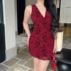 Detail of burgundy V-neck sleeveless dress featuring 3D floral flocking texture
