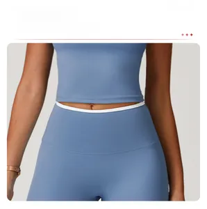 Detailansicht der blauen High-Waist Yoga-Hose mit Bauchweg-Effekt und elastischem Stoff