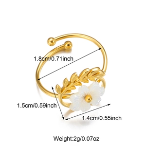 Detail shot of 18K gold stainless steel open ring with white flower and leaf accents