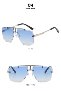 Close-up of rimless square sunglasses with blue gradient lenses and silver metal temples