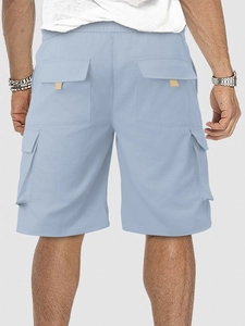 Rear view of light blue men cargo shorts showing side and back large utility pockets