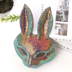 Macro detail of iridescent sequins on colorful rabbit party mask for Easter festivities