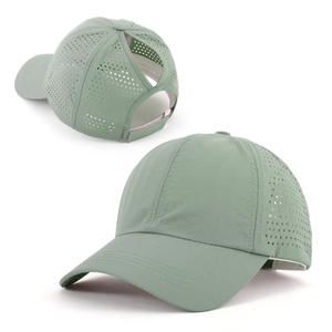 Quick-dry baseball cap in sage green showing laser-cut vents and ponytail opening