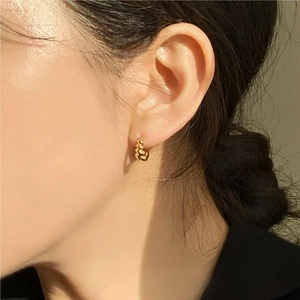 Minimalist 925 sterling silver twisted hoop earrings with golden rope texture for women