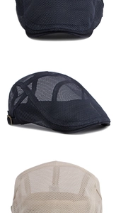 Detail of mesh sun hat showing adjustable metal side buckles and breathable fabric
