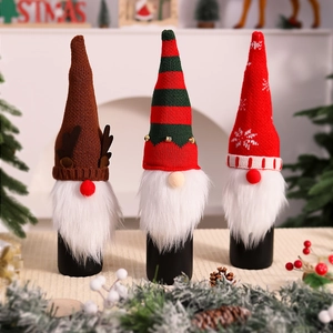 Three-piece knitted Christmas gnome wine bottle covers with plush beards and pointed hats