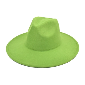 Detailed view of the neon green wool fedora hat with wide brim and structured crown top