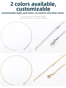 Detail view of gold and silver flat snake chains with lobster clasp and extension