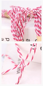 Macro shot of pink and white 1.5mm cotton baker twine showing detailed fiber texture