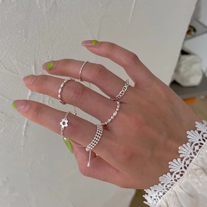 925 silver plated adjustable chain rings set with floral and geometric minimalist designs
