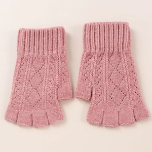 Close-up of pink knit fingerless arm warmers with detailed rhombus hollow pattern