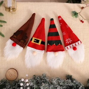 Set of 4 Christmas gnome wine bottle covers with knit fabric and festive reindeer motifs