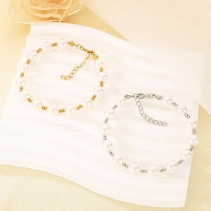 Elegant pearl bracelets in gold and silver finish with adjustable metal chains and clasps