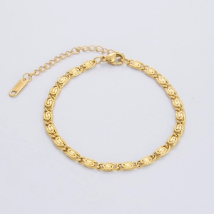 Detailed view of 18K gold plated steel bracelet with textured oval links and lobster clasp