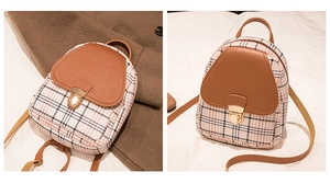 Detail of checkered mini backpack with brown faux leather flap and gold metal buckle
