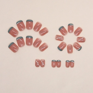 Short green French press-on nails with white pearls and cat-eye texture set