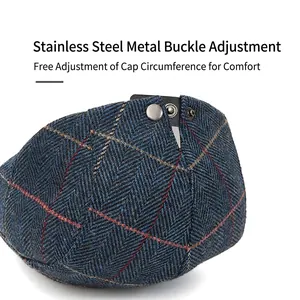 Blue herringbone newsboy cap with stainless steel adjustable snaps for a custom fit