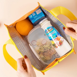 Insulated lunch bag with large capacity, aluminum foil lining, and durable yellow handles
