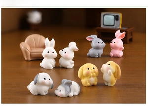 Set of 8 miniature resin bunnies in various poses for micro landscape and desk decoration