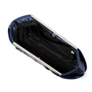 Detailed interior of blue pleated satin clutch bag with silver frame and black lining