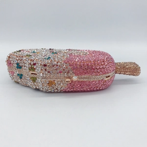 Detail view of the luxury popsicle evening bag showing colorful crystals and metal frame