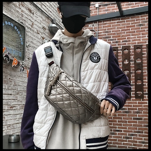 Detailed view of quilted cotton crossbody bag with adjustable strap and metallic finish