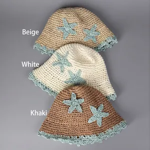 Handmade woven straw bucket hats with starfish design in beige, white, and khaki colors