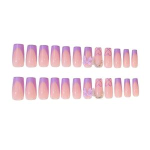 Lavender French press-on nails set with purple bows, heart lines and rhinestones