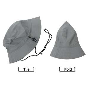 Foldable dark grey bucket hat with adjustable windproof cord for easy travel storage