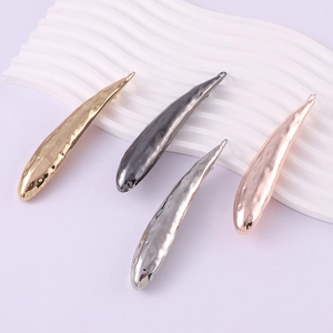 Detail of lava texture metal hair clips in gold, silver, gun black, and rose gold finishes
