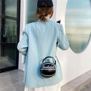 Fashionable black basketball shaped crossbody bag with gold chain strap for women