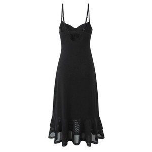 Detail view of back cutout design and ruffled mesh hem on a slim black maxi dress