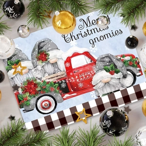 Christmas place mat with gnomes on red truck and black white buffalo plaid pattern