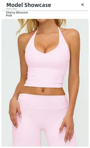 Detail of Sakura Pink v-neck halter sports bra and high-waist yoga leggings on model