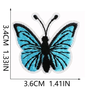 Detailed macro view showing dimensions of the blue butterfly embroidered patch