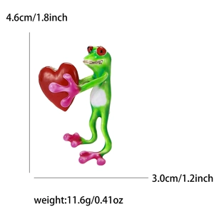 Enamel frog holding heart brooch pin with size dimensions 4.6cm by 3.0cm and weight info
